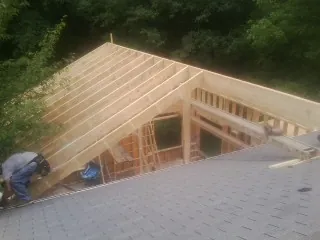 Framing a new roof addition that ties into an existing shingle roof in Pomeroy